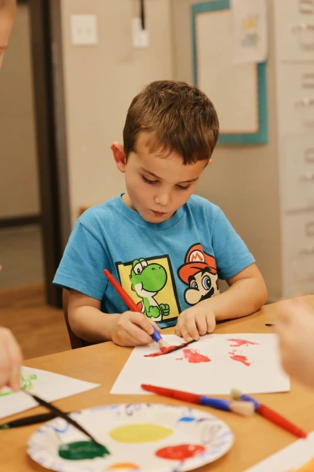 young boy arts and crafts